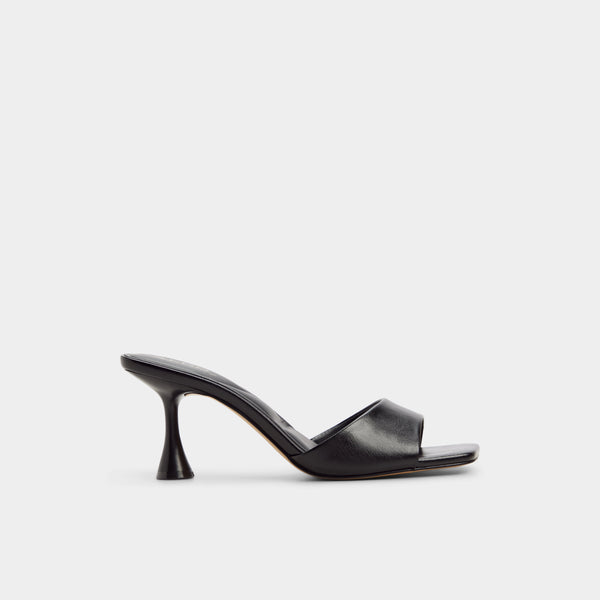 Black high-heeled sandal on a light gray background