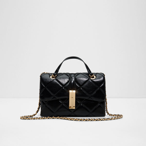 The ALDO Alicie Quilted Top Handle Bag in black features a patent-like finish, large diamond quilting, polished gold-tone hardware, and an interwoven gold chain shoulder strap with a separate structured top handle.