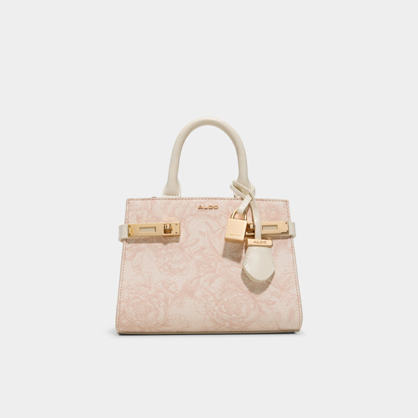Beige handbag with gold accents on a light gray background