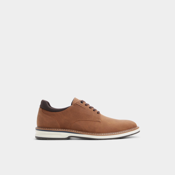 A single brown suede lace-up dress shoe shown in profile against a light gray background.